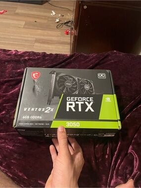 MSI GeForce RTX 3050 Ventus 2X Black and Green Graphics Card Box
